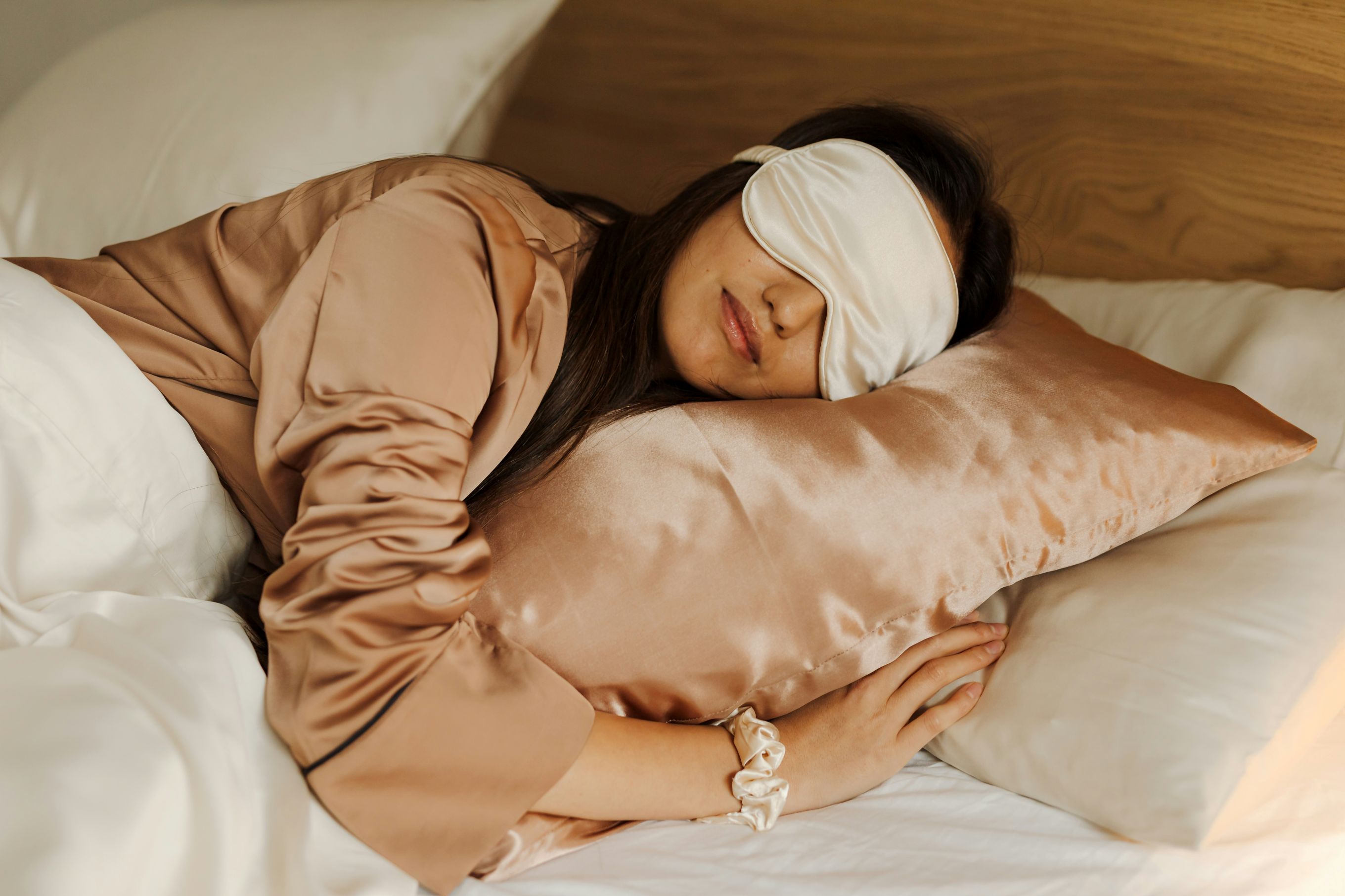 woman sleeping with sleep mask